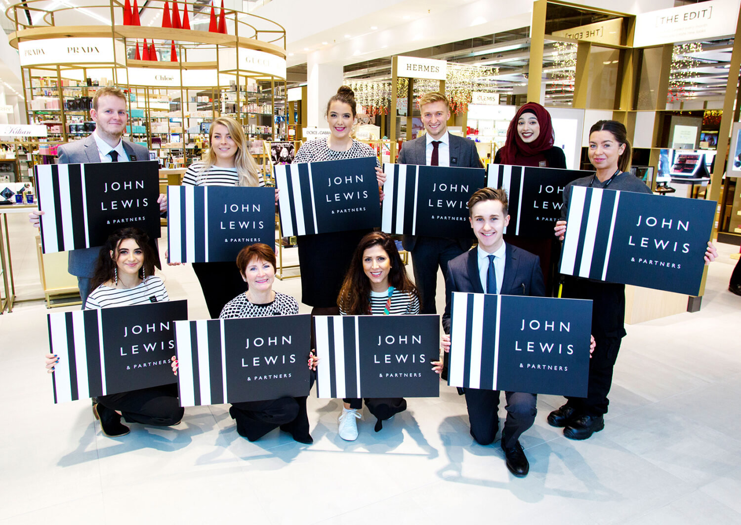 John Lewis restores staff bonus as profits improve