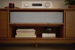 LS JBL 245CWHT ProductOnAudioCabinetUnderTVGrillOn MA510WHT 00513