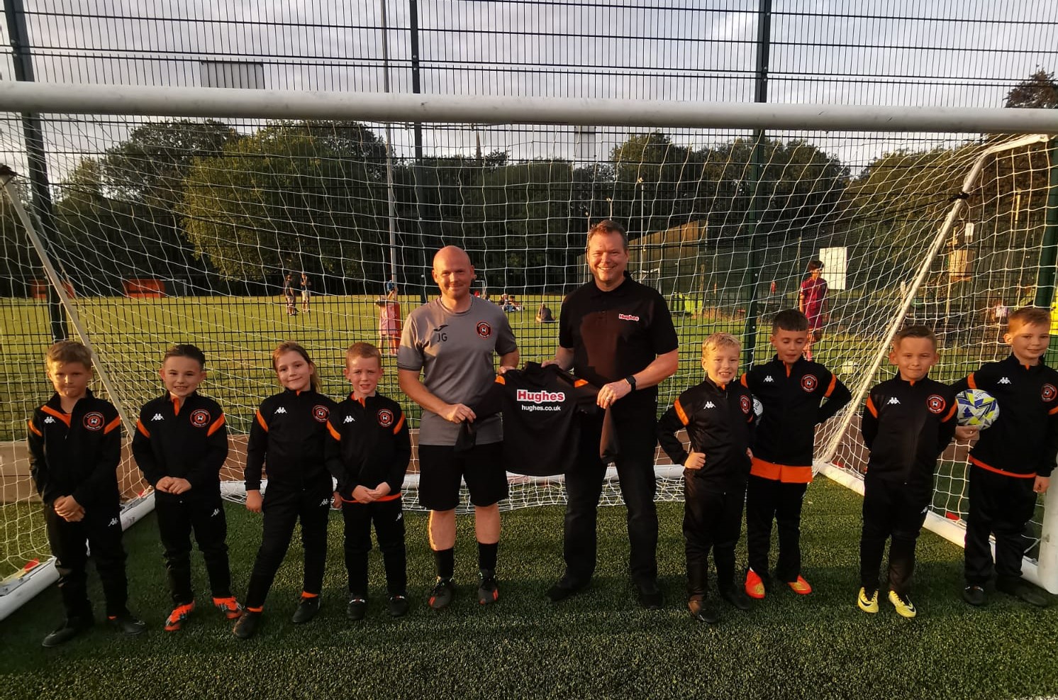 Hughes Electrical supplies football team with custom-made tracksuits