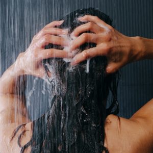 Woman Washing Hair Water SQ